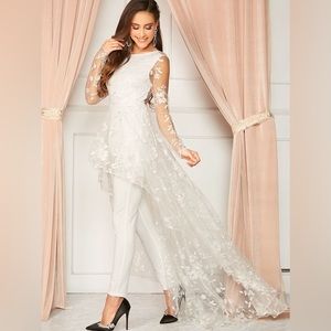 Bridal jumpsuit with embroidered skirt and train